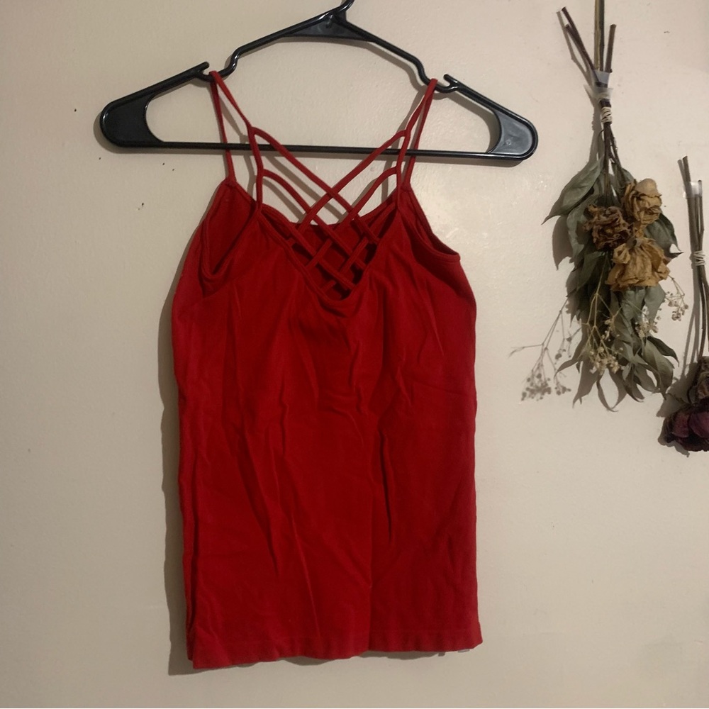 Red spaghetti strap tank top with criss cross string cut out